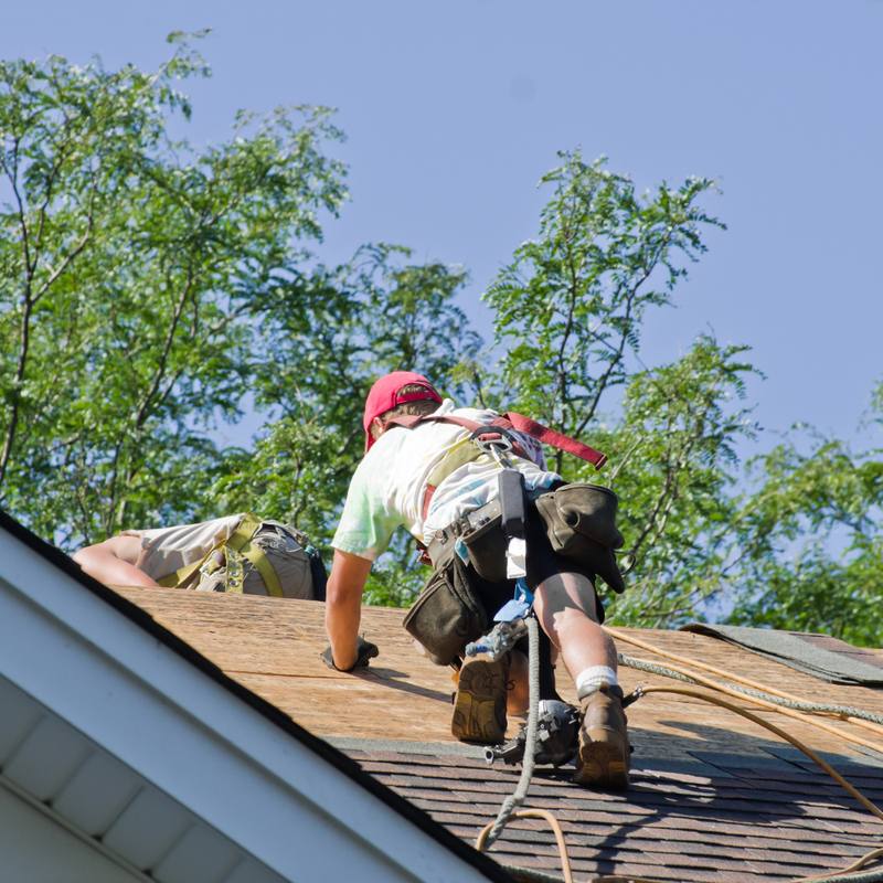 Roofing team on roof